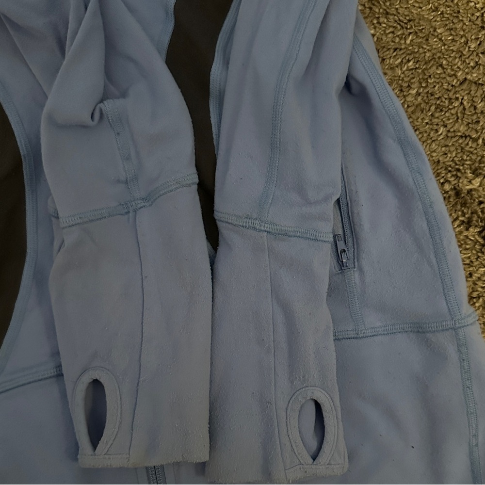 Size 4 Lululemon stretchy hoodie. Bought in Vegas. Nylon/Lycra/spandex. - Picture 6 of 6